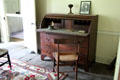 Roll-top desk in dining room in Powell House at Old Bethpage Village. Old Bethpage, NY.