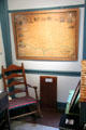 Old Sag Harbor map & wooden rocking chair at Annie Cooper Boyd House museum. Sag Harbor, NY.