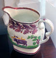 Lusterware cream pitcher with embossed cow & oak leaf design at Home Sweet Home Museum. East Hampton, NY.
