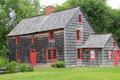 Mulford Farm saltbox style with bare wood siding. East Hampton, NY