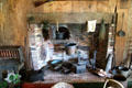 Brick fireplace with cooking implements at Thomas Halsey Homestead. South Hampton, NY.