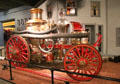 Firefighting steam pumper by Amoskeac Manu. Co. of Manchester, NH at carriage collection of Long Island Museum. Stony Brook, NY.