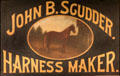 John B. Scudder harness maker advertising sign at carriage collection of Long Island Museum. Stony Brook, NY.