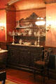Sideboard with silver candlesticks in dining room at Roosevelt's House Sagamore Hill NHS. Cove Neck, NY.