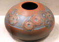 Earthenware red bowl by Charles Steward Todd of Rookwood Pottery Co. of Cincinnati at Cincinnati Art Museum. Cincinnati, OH.