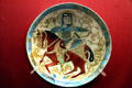 Persian earthenware bowl with enameled riding archer at Toledo Museum of Art. Toledo, OH.