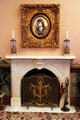 Fireplace with portrait of Ida Saxton McKinley in parlor at Ida Saxton McKinley Historic House. Canton, OH