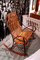 Wide rustic rocking chair used by McKinley's at McKinley Presidential Library & Museum. Canton, OH.