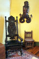 Carved wood merman & oak stained black chair in ballroom at Hower House. Akron, OH.