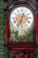 Tall clock face with painted village scene at Sherwood-Davidson House. Newark, OH.