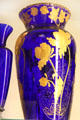 Blue glass vase with gold flowers at National Museum of Cambridge Glass. Cambridge, OH.