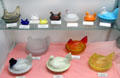 Nesting chicken dishes by several makers at Degenhart Paperweight & Glass Museum. Cambridge, OH.