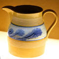 Yellow ware pitcher with blue seaweed decoration attrib. to McNicol & Burton at Museum of Ceramics. East Liverpool, OH