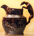 Rockingham pitcher with hound handle by Harker, Taylor & Co. of East Liverpool at Museum of Ceramics. East Liverpool, OH