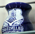 Zanesville Bicentennial ceramic jar with Y bridge & Old Capitol motif at Stone Academy Museum. Zanesville, OH.