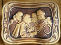 Embossed tray with monks by American Encaustic Tiling Co. at Mathews House Museum. Zanesville, OH.