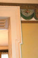Projecting door frame & frieze border along ceiling architectural details at Kelton House Museum. Columbus, OH.