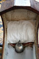 Cradle with antique baby bottle in Whitney home at Historic Kirtland Village. Kirtland, OH.