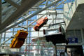 Decorated Trabant cars hang in lobby of Rock & Roll Hall of Fame. Cleveland, OH.