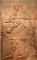 Assyrian relief of Saluting Protective Spirit from Nimrud Northwest Palace at Cleveland Museum of Art. Cleveland, OH.