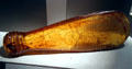 Paddle carved from kauri copal amber-like resin from Araucaria trees at Cleveland Museum of Natural History. Cleveland, OH.