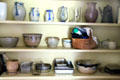 Glass & salt glaze pitchers & bowls in Herrick House at Hale Farm. Cleveland, OH.