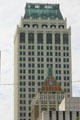 Mid-Continent Tower over red Philtower tiled roof. Tulsa, OK.