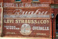 Antique Levi Strauss Overalls painted on Redmen's Hall. Jacksonville, OR.