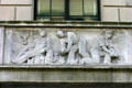 Art Deco relief of workers laying brick on North Office Building of State Government complex. Harrisburg, PA.