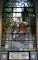 Stained glass window of knight commemorating Cornelius Vanderbilt by Tiffany at Trinity Church. Newport, RI.
