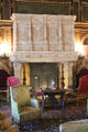 Stone fireplace from Chateau d'Arnay le Duc of Burgundy, France in Library at The Breakers. Newport, RI.