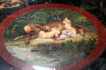 Mosaic insert of Romulus & Remus with wolf on hall table at Kingscote. Newport, RI.