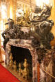 Gold Room Bacchus fireplace flanked by candelabras of old age & youth figures at Marble House. Newport, RI.