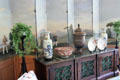 Chinese porcelain in front of painted folding screen in Sun Room at Chepstow. Newport, RI.