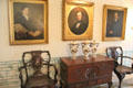 Upstairs hallway with portraits & antique furniture at Chepstow. Newport, RI.