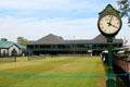 Courtyard grass tennis courts & street clock at Newport Casino. Newport, RI.