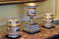Porcelain vase & pair of covered urns decorated with gold & black at Rough Point. Newport, RI.