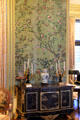Antique hand-painted Chinese wallpaper over Louis XV/XVI ebony & lacquer cabinet in Music Room at Rough Point. Newport, RI.