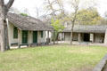 Celso Navarro house plus log cabin at Witte Museum. San Antonio, TX.
