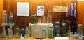 Collection of antique food bottles in lobby at Houston City Hall. Houston, TX.