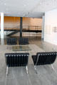 Barcelona chairs by Ludwig Mies van der Rohe in lobby at Museum of Fine Arts, Houston. Houston, TX.