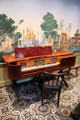 Gibson & Davis square grand piano from New York City under mural wallpaper with Indian scene in Music Room at Bayou Bend. Houston, TX