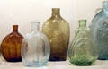 Antique American mold-blown glass flasks at Bayou Bend. Houston, TX.