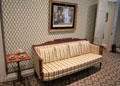 Sofa & side table in McIntire bedroom at Bayou Bend. Houston, TX.