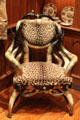 Cow horn chair with wildcat upholstery at Bayou Bend. Houston, TX.