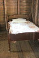 Bed with quilt in Old Place at Sam Houston Park. Houston, TX.