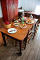 Kitchen table at Nichols-Rice-Cherry House at Sam Houston Park. Houston, TX.