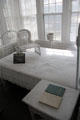 White bedroom in Staiti House at Sam Houston Park. Houston, TX.