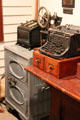 Typewriter, adding machine & office safe in General Store at Sam Houston Park. Houston, TX.