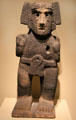 Aztec culture volcanic stone standing male figure from Mexico at San Antonio Museum of Art. San Antonio, TX.